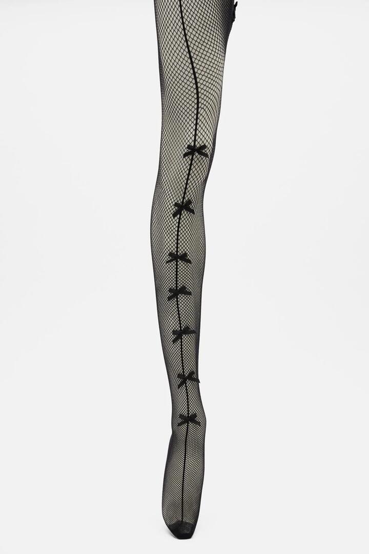 Image of Lingerie. Productname: Bows Fishnet Tights in Black colour by brand - Dangerfield