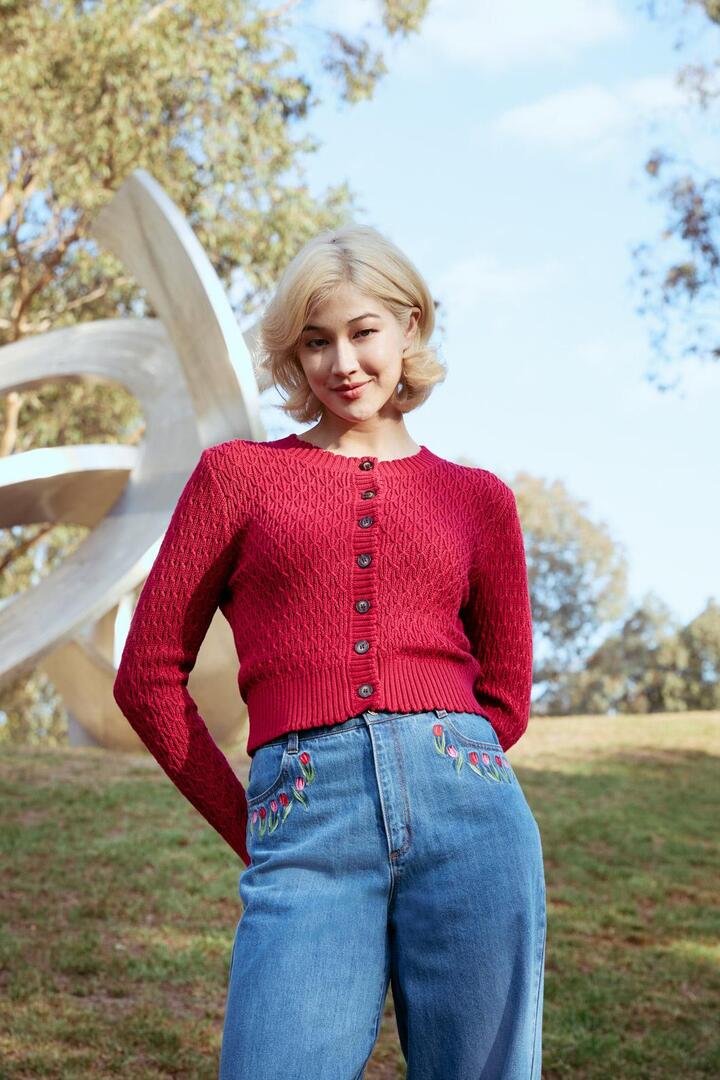 Image of a model wearing Outerwear. Productname: Amelia Knit Cardigan in Red colour by brand - Princess Highway