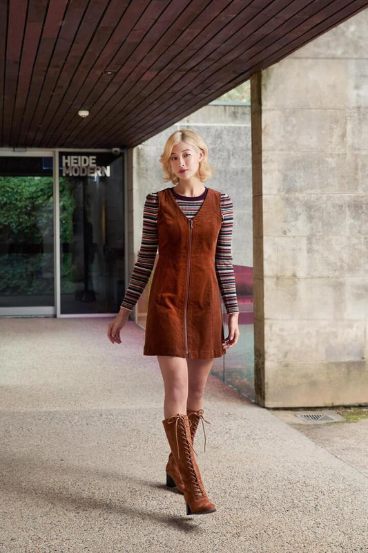 Image of a model wearing Dress. Productname: Honey Cord Pinafore in Wine colour by brand - Princess Highway
