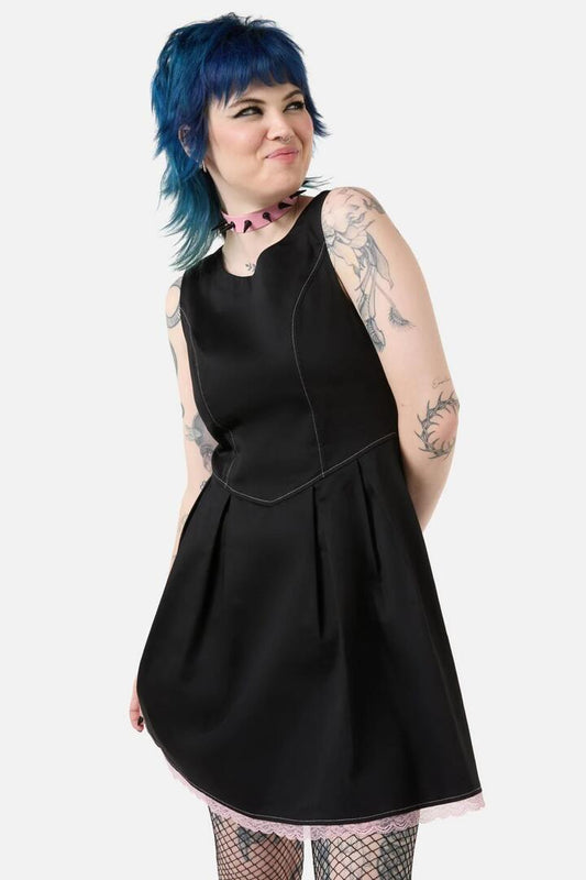 Image of a model wearing Dress. Productname: Moon Time Pinny in Black colour by brand - Dangerfield