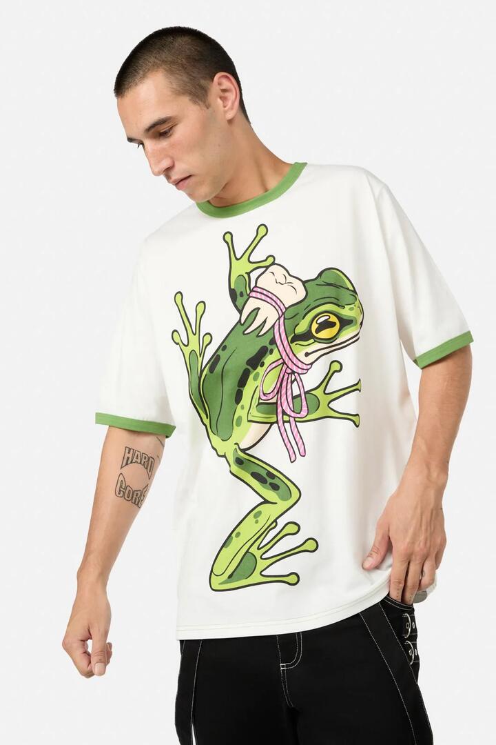 Image of a model wearing Tops. Productname: Fancy Frog Tee in Cream colour by brand - Dangerfield
