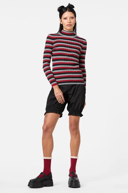 Image of a model wearing Tops. Productname: Moggy Tartan Knit Skivvy in Multi colour by brand - Dangerfield