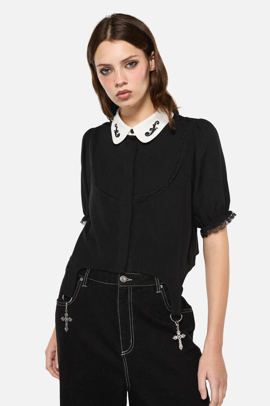 Image of a model wearing Tops. Productname: Little Bitter Maid Crop Blouse in Black colour by brand - Dangerfield