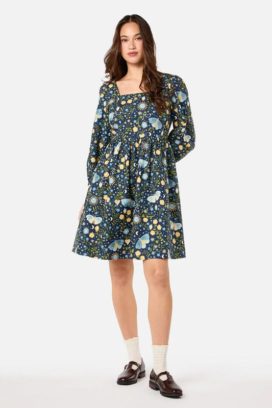 Image of a model wearing Dress. Productname: Folk Art Mini Dress in Blue colour by brand - Princess Highway