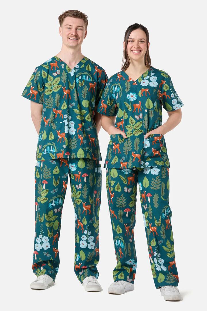 Image of a model wearing Uniforms & Workwear. Productname: Winter Deer Scrub Set in Teal colour by brand - Scrubs With Love