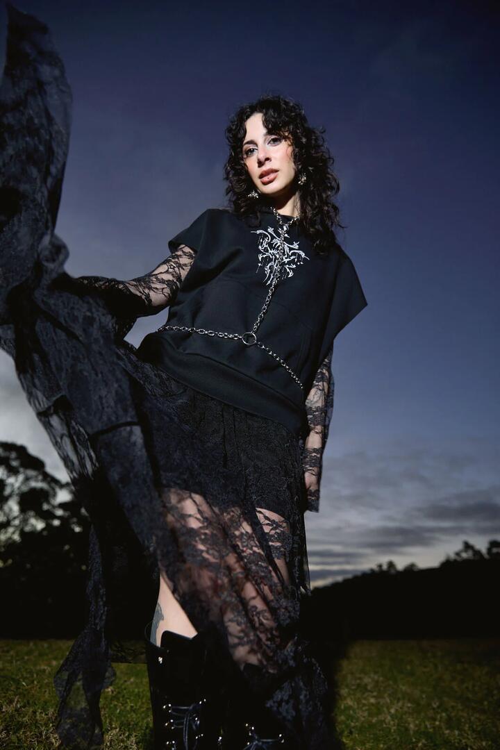 Image of a model wearing Outerwear. Productname: Tech Sleeveless Hoodie in Black colour by brand - Black Friday