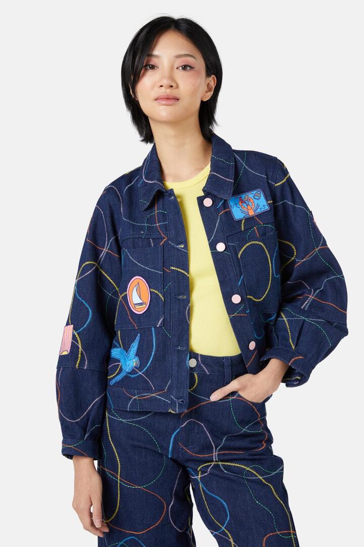 Image of a model wearing Outerwear. Productname: Taking A Trip Embroidered Jacket in Print colour by brand - Gorman