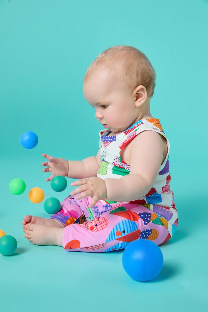 Image of a model wearing Tops. Productname: Cupcakes Baby Tank in Cream colour by brand - Gorman