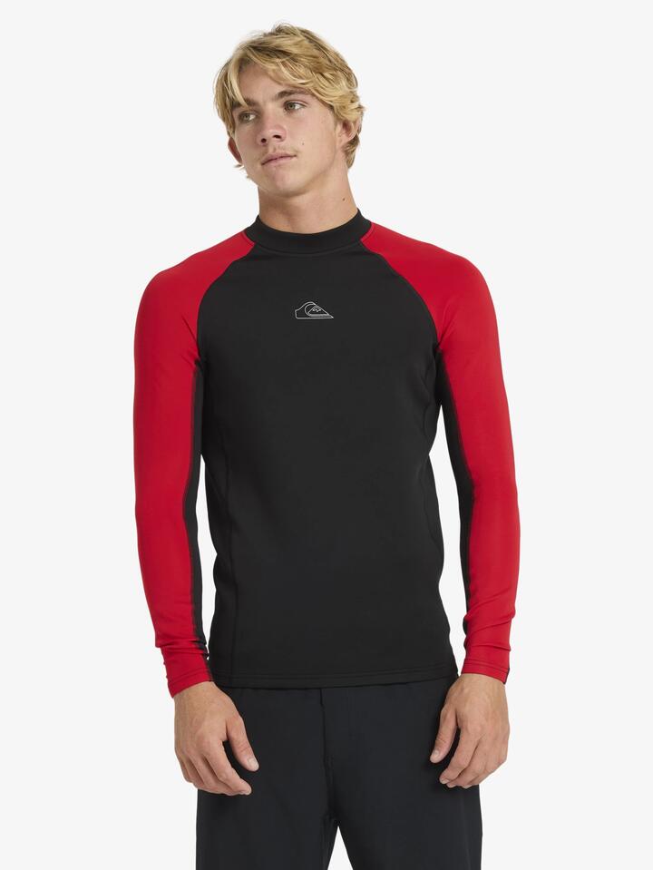 Image of a model wearing Tops. Product name - Quiksilver Mens Everyday Heat Panel Long Sleeve Rash Vest Salsa in Salsa colour by brand - Quiksilver