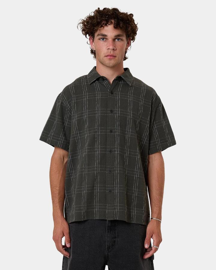 Image of a model wearing Tops. Productname: Thrills - Mens Built To Win Short Sleeve Shirt - Green - in Green colour by brand - Thrills