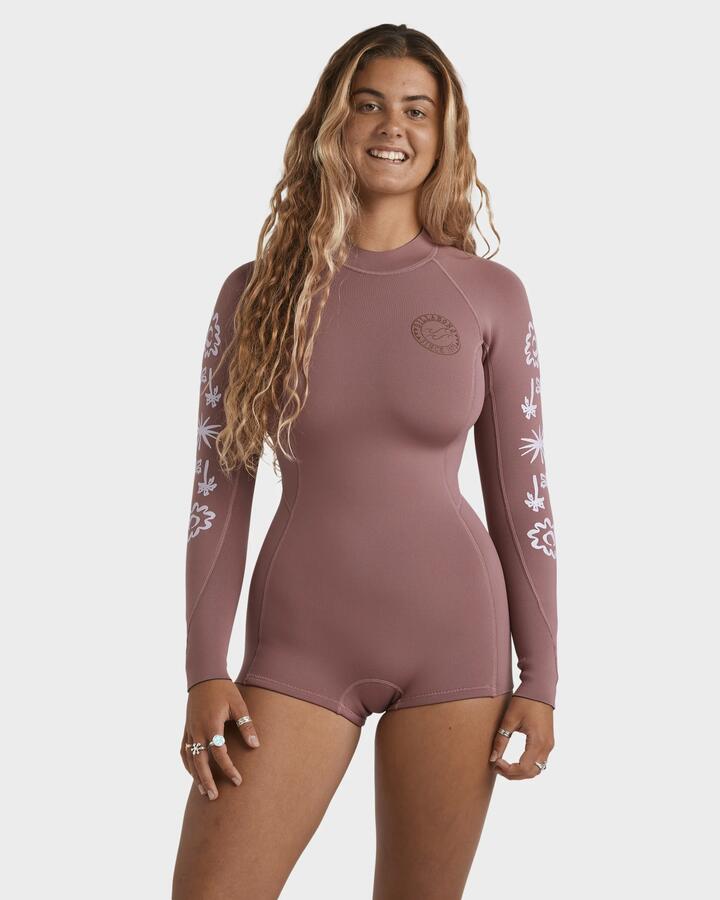 Image of a model wearing Tops. Product name - Billabong Womens 2/2Mm Spring Fever Natural Long Sleeve Springsuit Rosewood in Rosewood colour by brand - Billabong