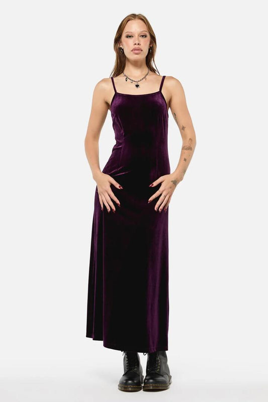 Image of a model wearing Dress. Productname: Regal Velvet Dress in Purple colour by brand - Black Friday