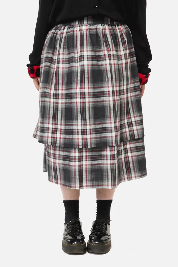 Image of a model wearing Skirts. Productname: Curve Moggy Tartan Layered Skirt in Grey colour by brand - Dangerfield