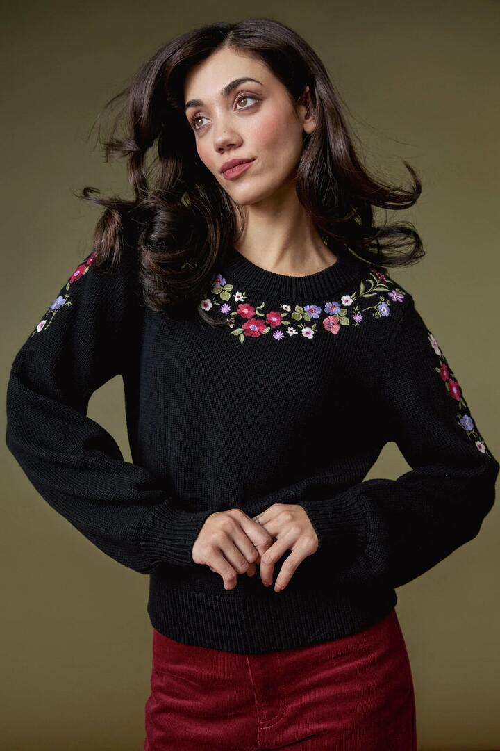 Image of a model wearing Outerwear. Productname: Ada Embroidered Jumper in Black colour by brand - Princess Highway