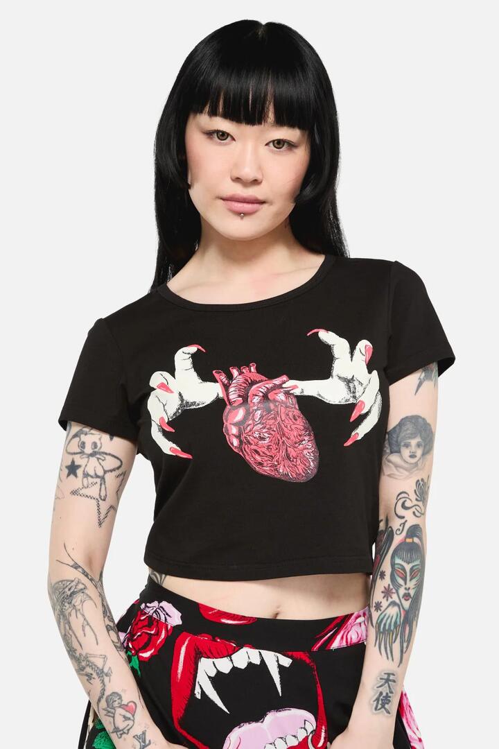 Image of a model wearing Tops. Productname: Stolen Hearts Tee in Black colour by brand - Black Friday