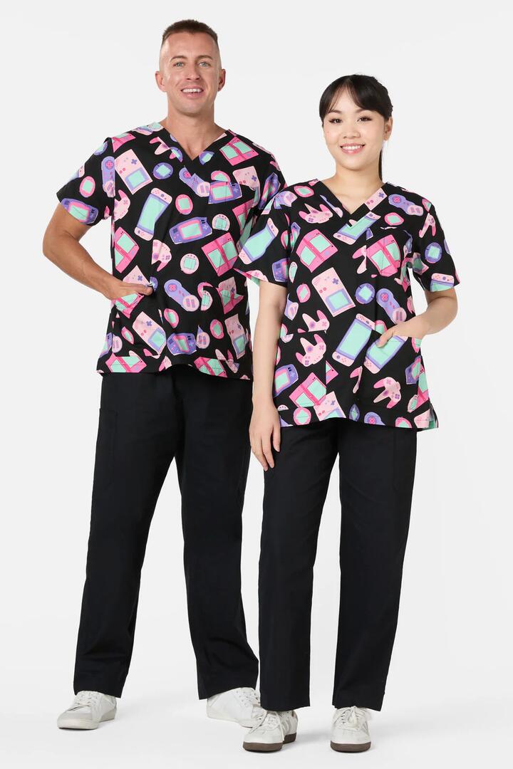 Image of a model wearing Pants. Productname: Tech Head Top & Pant Scrub Set in Black colour by brand - Scrubs With Love