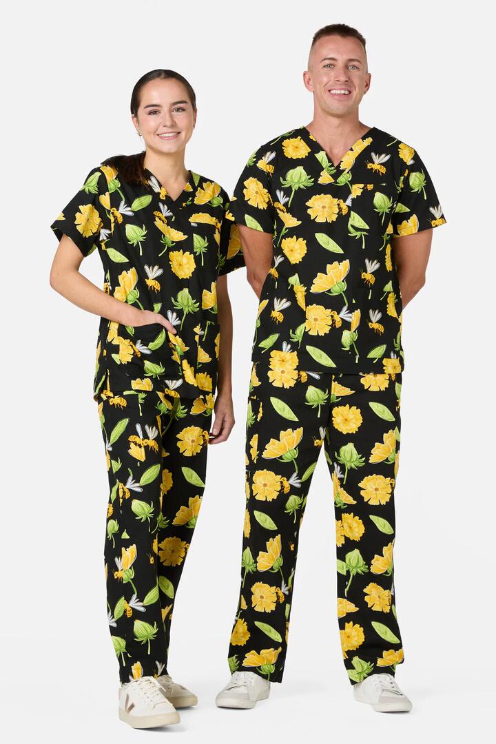 Image of a model wearing Uniforms & Workwear. Productname: Buzzy Bee Scrub Set in Black colour by brand - Scrubs With Love