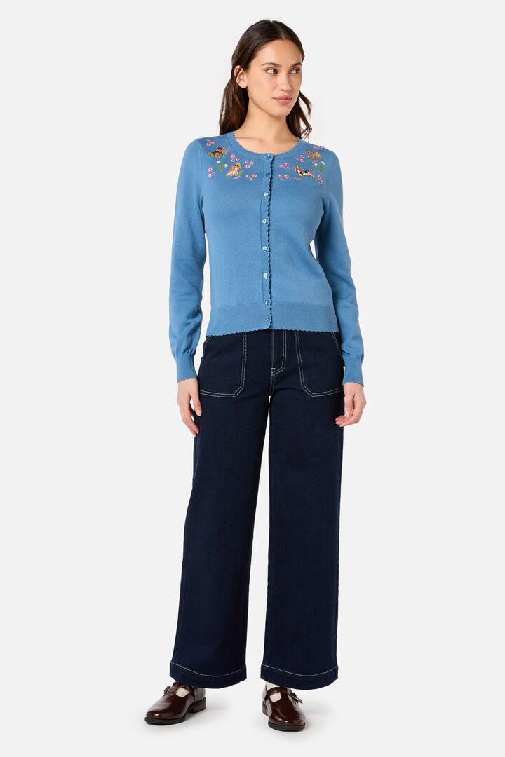 Image of a model wearing Outerwear. Productname: Cute Dogs Embroidered Cardigan in Blue colour by brand - Princess Highway