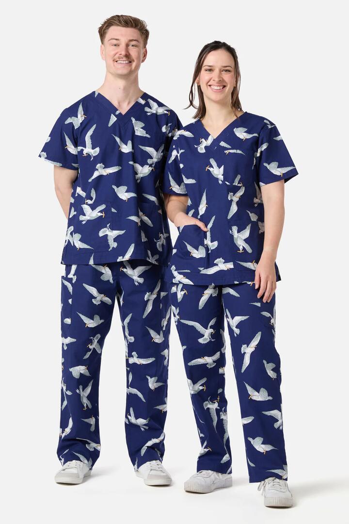 Image of a model wearing Uniforms & Workwear. Productname: Seagull Scrub Set in Navy colour by brand - Scrubs With Love