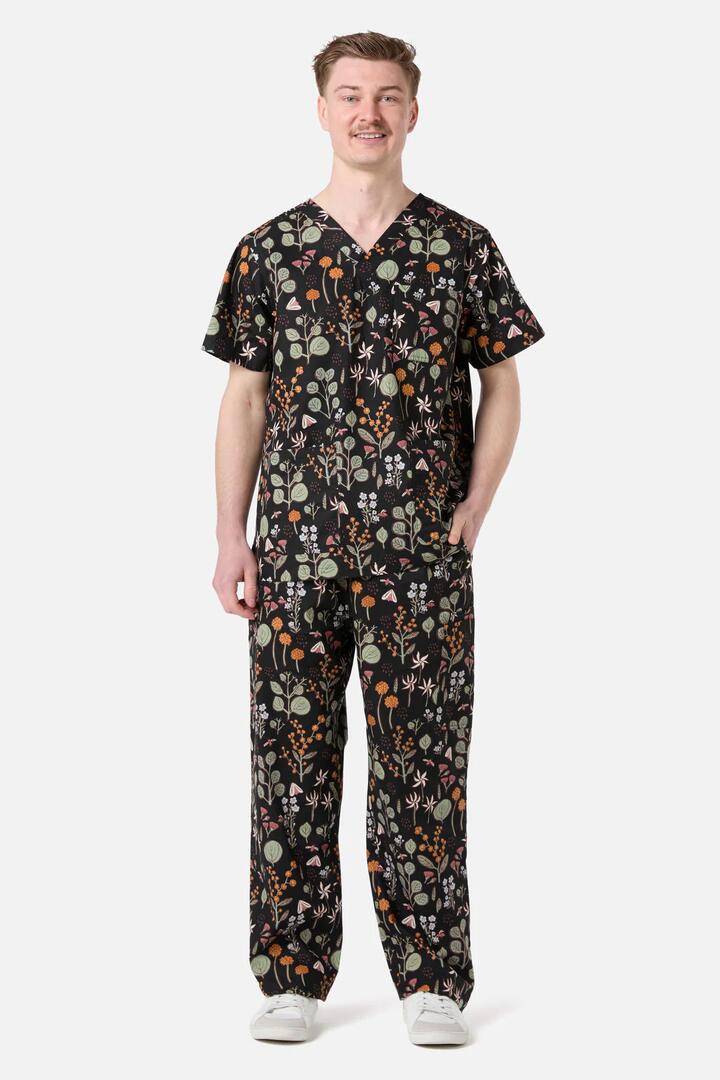 Image of a model wearing Uniforms & Workwear. Productname: Botanical Scrub Set in Black colour by brand - Scrubs With Love