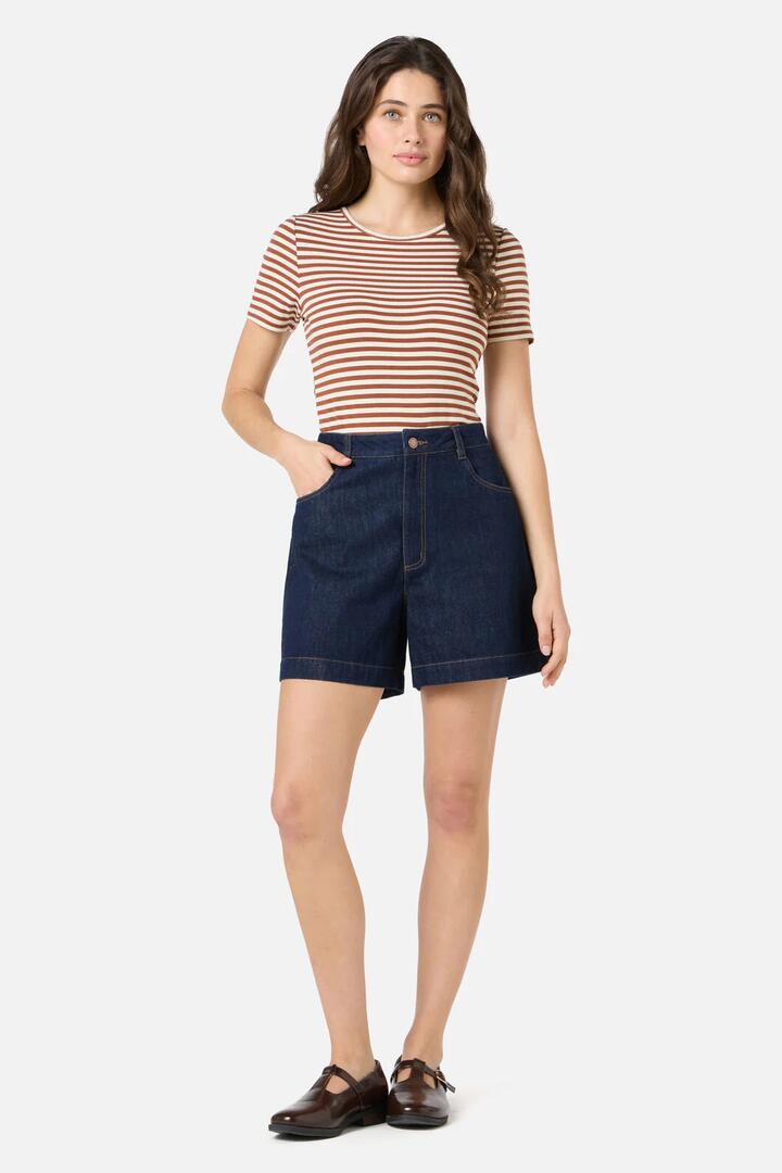 Image of a model wearing Denim. Productname: Jillian Denim Short in Dark Denim colour by brand - Princess Highway