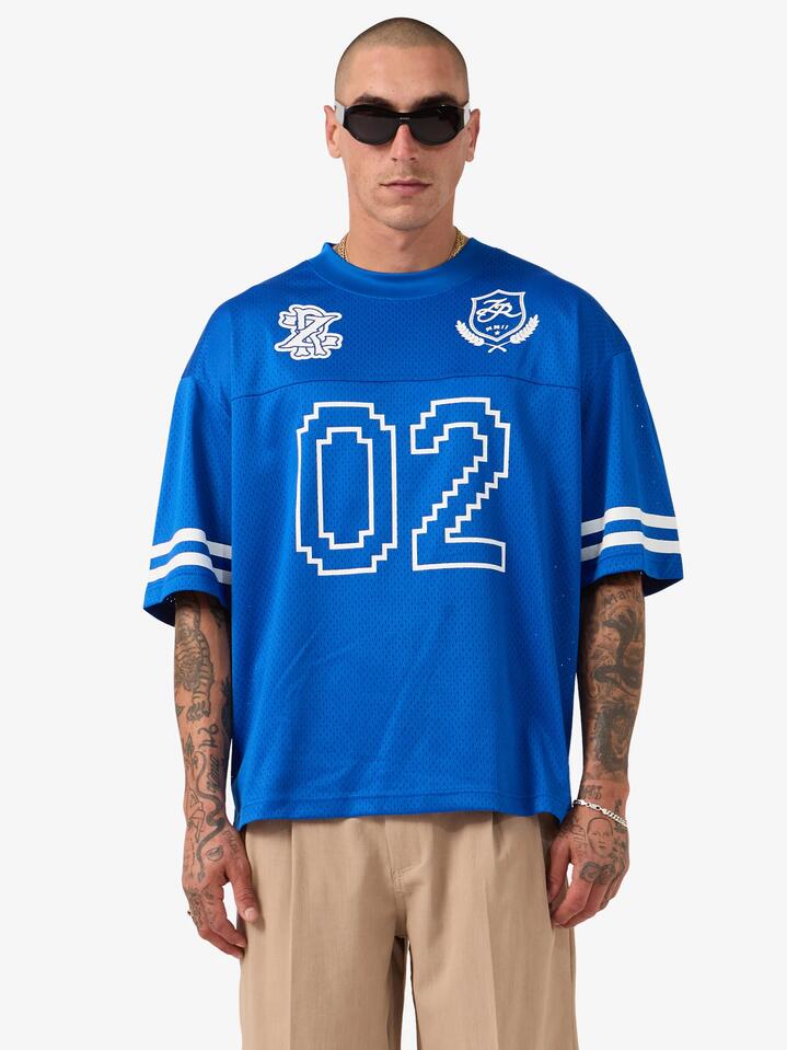 Image of a model wearing Tops. Productname: Zanerobe Heritage Mesh Flow Shirt in Cobalt Blue colour by brand - Zanerobe