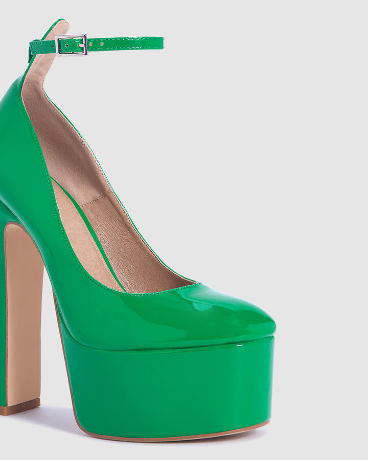 Image of Heels. Product name - Zippedy Green Patent Platform Heels in Green colour by brand - Novo