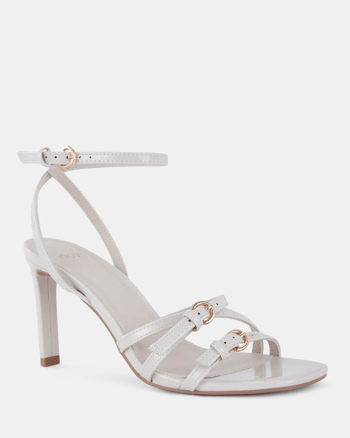 Image of Heels. Productname: Madaio: Cream Patent - Women's Strappy - High Heel in Neutral colour by brand - Novo