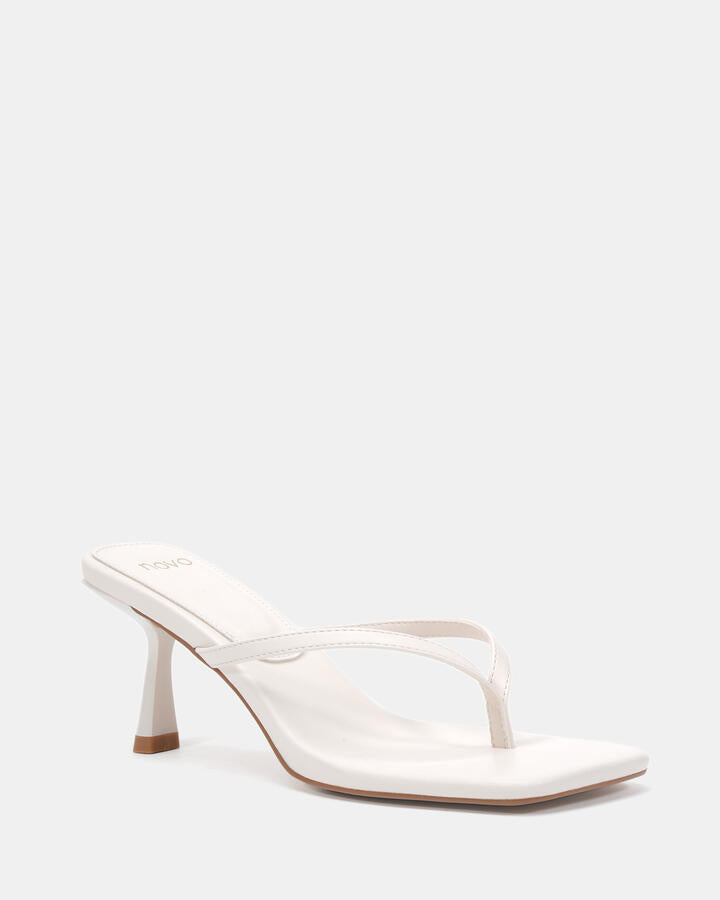 Image of Heels. Product name - Zania White Heels in Multi colour by brand - Novo
