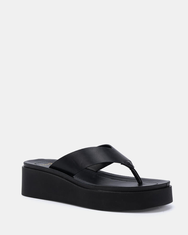 Image of Sandals. Product name - Berri Black Wedge Sandals in Black colour by brand - Novo