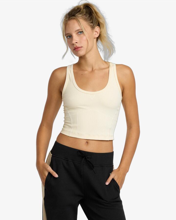 Image of a model wearing Tops. Productname: RVCA - Womens Contrast B Tank Top - Vintage Khaki - in Vintage Khaki colour by brand - RVCA