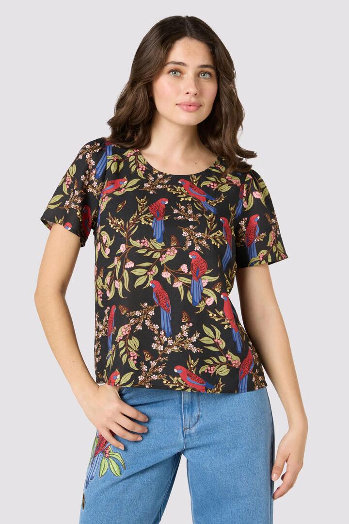 Image of a model wearing Shorts. Productname: Rosella Short Sleeve Top in Black colour by brand - Princess Highway