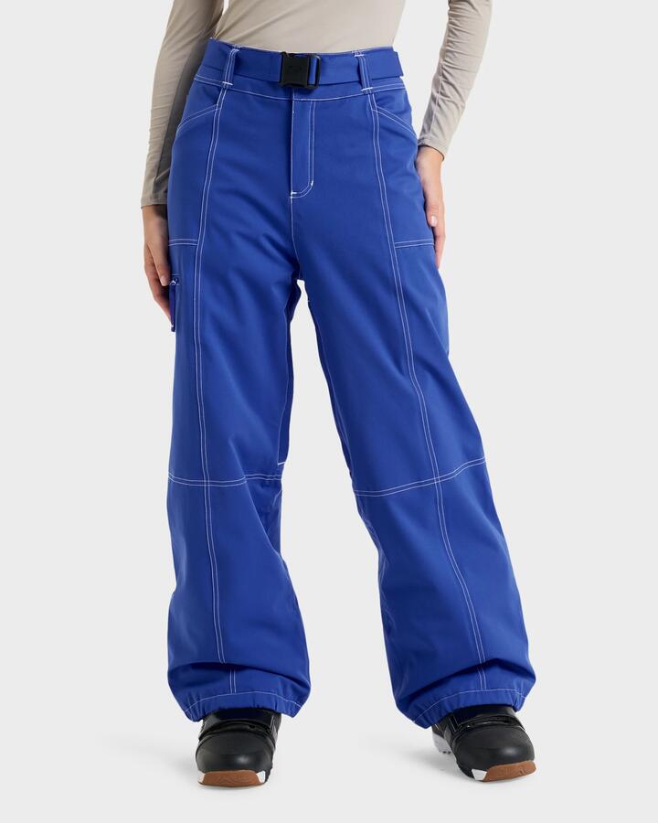 Image of a model wearing Pants. Product name - Roxy Womens Chloe Kim Snow Pants Dazzling Blue in Dazzling Blue colour by brand - Roxy