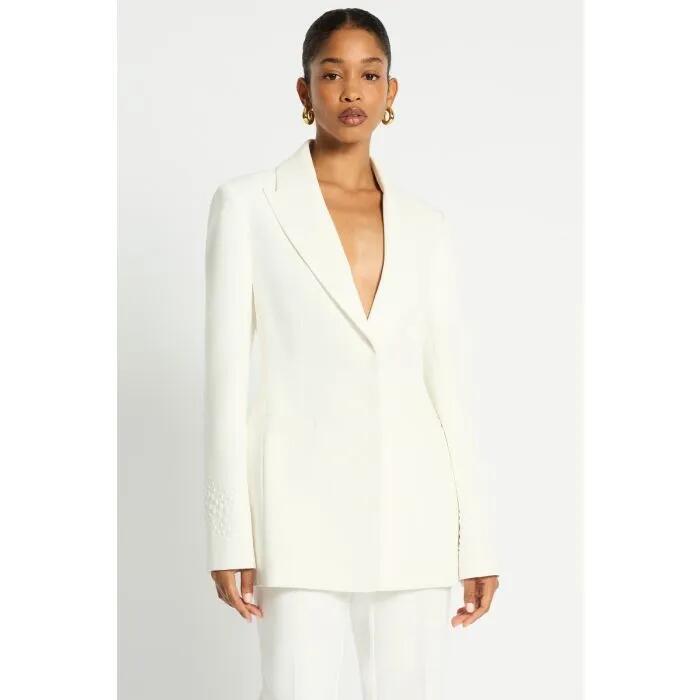 Image of a model wearing Outerwear. Productname: Alatra Blazer in Ivory colour by brand - sass and bide
