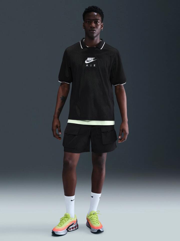 Image of a model wearing Tops. Productname: Nike Men's Air Football Jersey in Black/White colour by brand - Nike