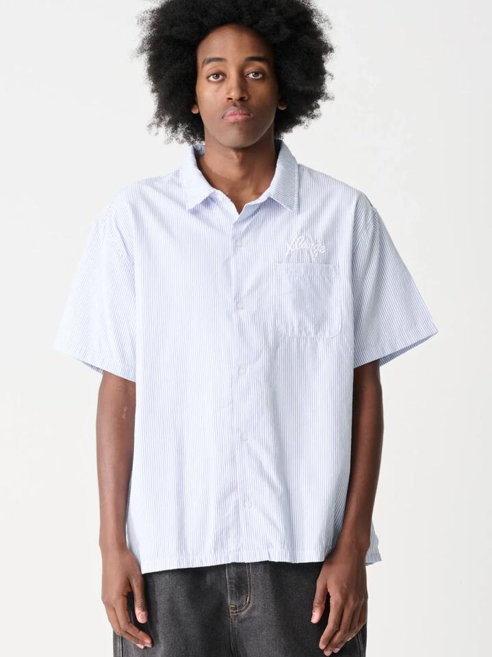 Image of a model wearing Tops. Productname: Xlarge Warp Ss Shirt in BLUE colour by brand - Xlarge