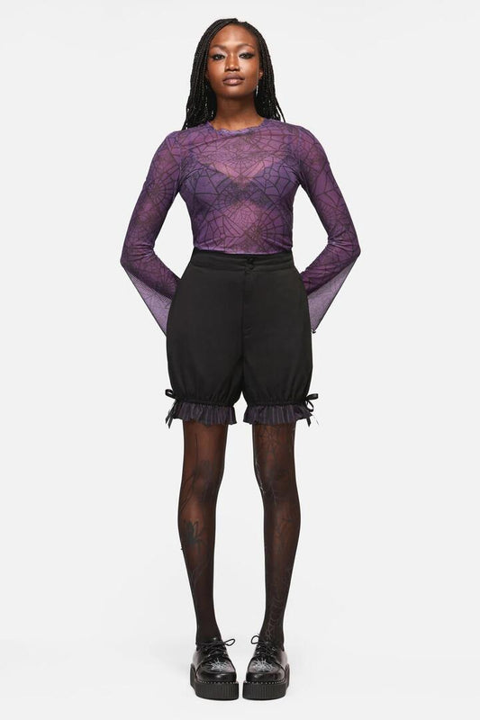 Image of a model wearing Shorts. Productname: Sabrina Goth Bloomer Short in Black/Purple colour by brand - Black Friday