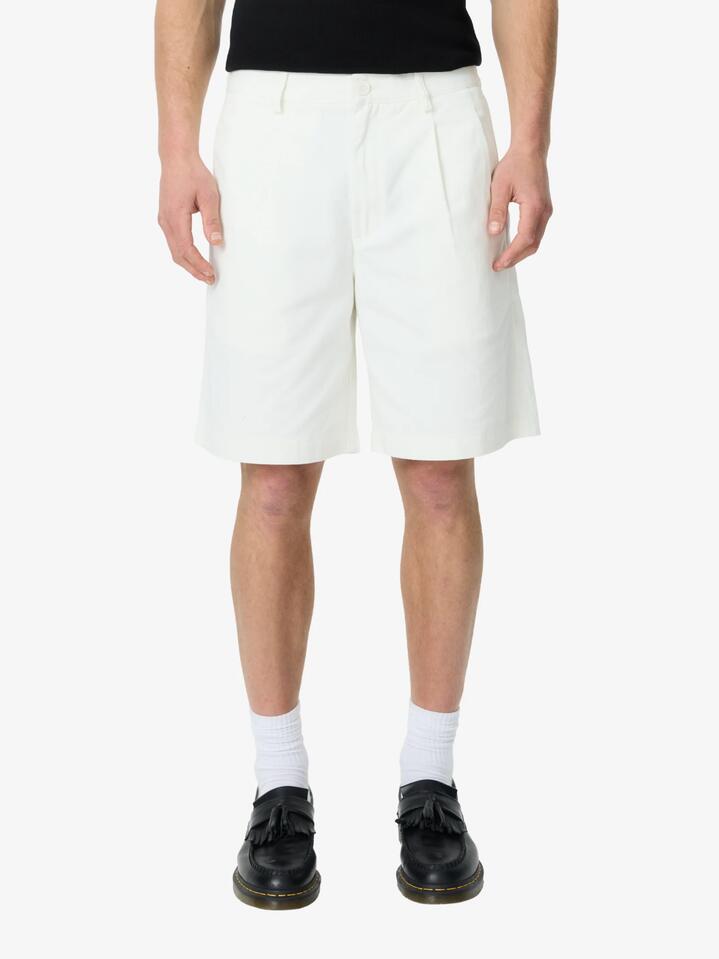 Image of a model wearing Pants. Productname: Article One Bolton Chino Short in Ecru colour by brand - Article One