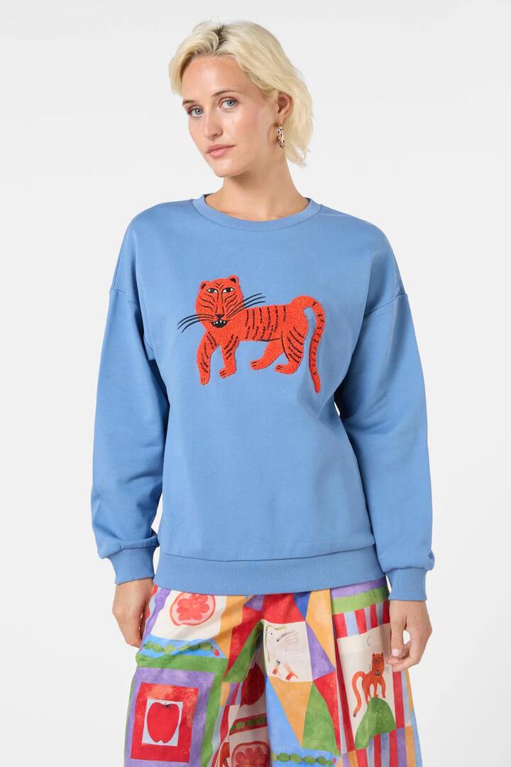 Image of a model wearing Outerwear. Productname: Fantasy Patchwork Tufted Sweat in Blue colour by brand - Gorman