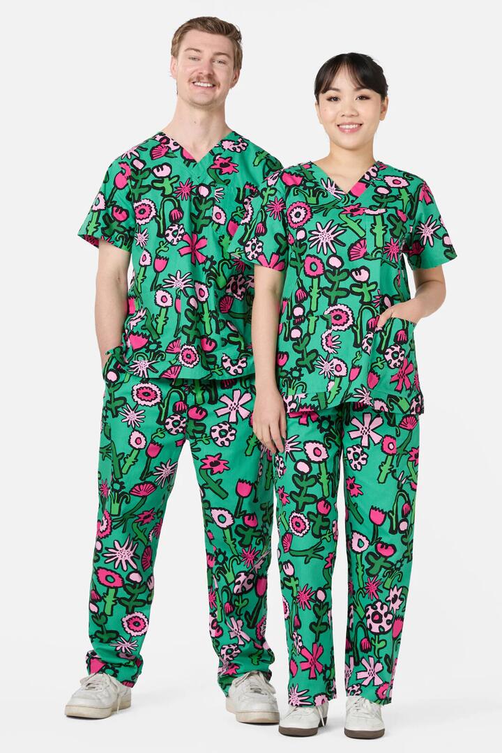 Image of a model wearing Uniforms & Workwear. Product name - Bloom'N'Blossom Scrub Set in Green colour by brand - Gorman