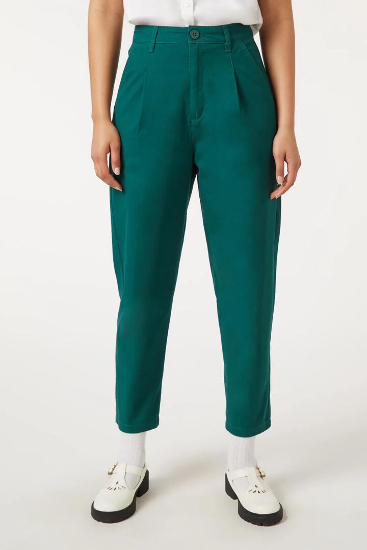 Image of a model wearing Pants. Product name - Harvard Pant in Violet colour by brand - Princess Highway