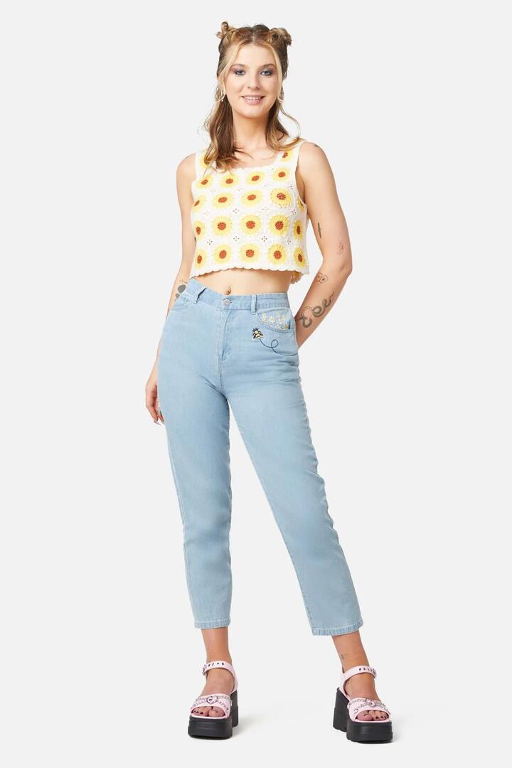 Image of a model wearing Tops. Product name - Sunflower Crochet Top in Cream colour by brand - Dangerfield