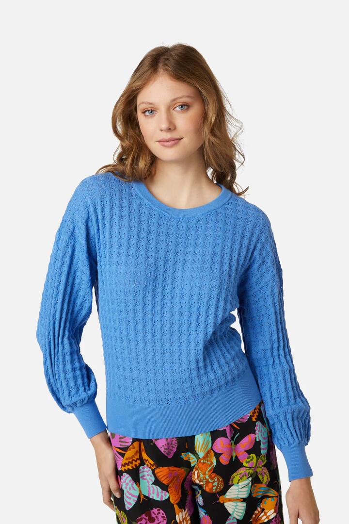 Image of a model wearing Outerwear. Productname: Stella Sweater in Berry colour by brand - Princess Highway