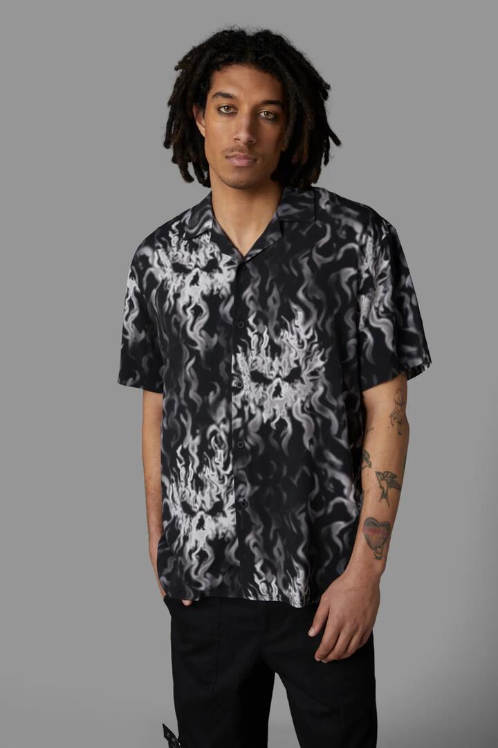 Image of a model wearing Shorts. Productname: Up In Flames Short Sleeve Shirt in Red colour by brand - Black Friday