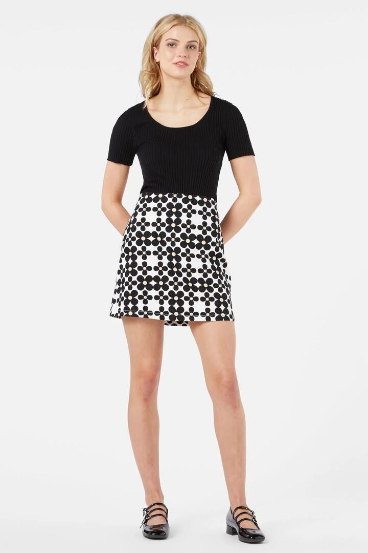 Image of a model wearing Skirts. Productname: Juni Mini Skirt in Black colour by brand - Princess Highway