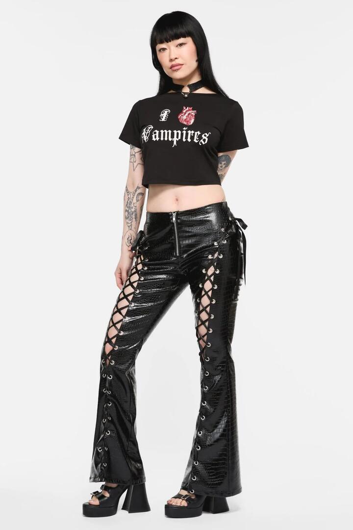 Image of a model wearing Pants. Product name - Scales Lace Up PU Pant in Black colour by brand - Black Friday