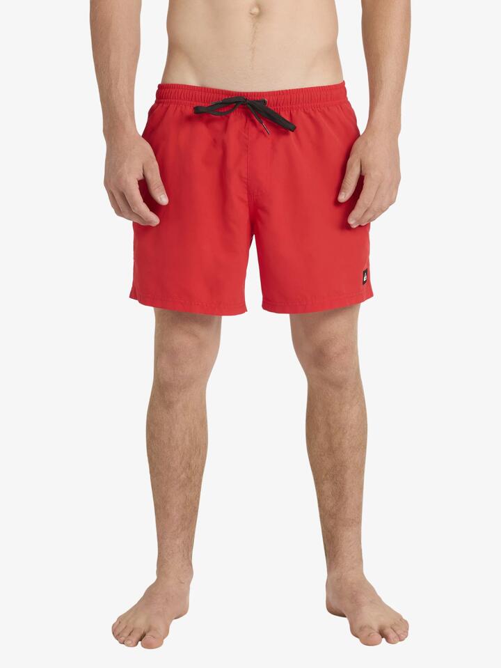 Image of a model wearing Shorts. Product name - Quiksilver Mens Everyday Solid Volley 15" Swim Shorts High Risk Red in High Risk Red colour by brand - Quiksilver