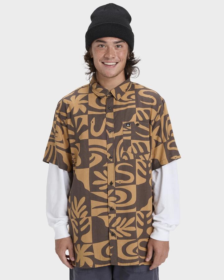 Image of a model wearing Tops. Productname: Quiksilver Mens Safe Paradise Short Sleeve Shirt Almond Desert Checker - in Almond Desert Checker colour by brand - Quiksilver