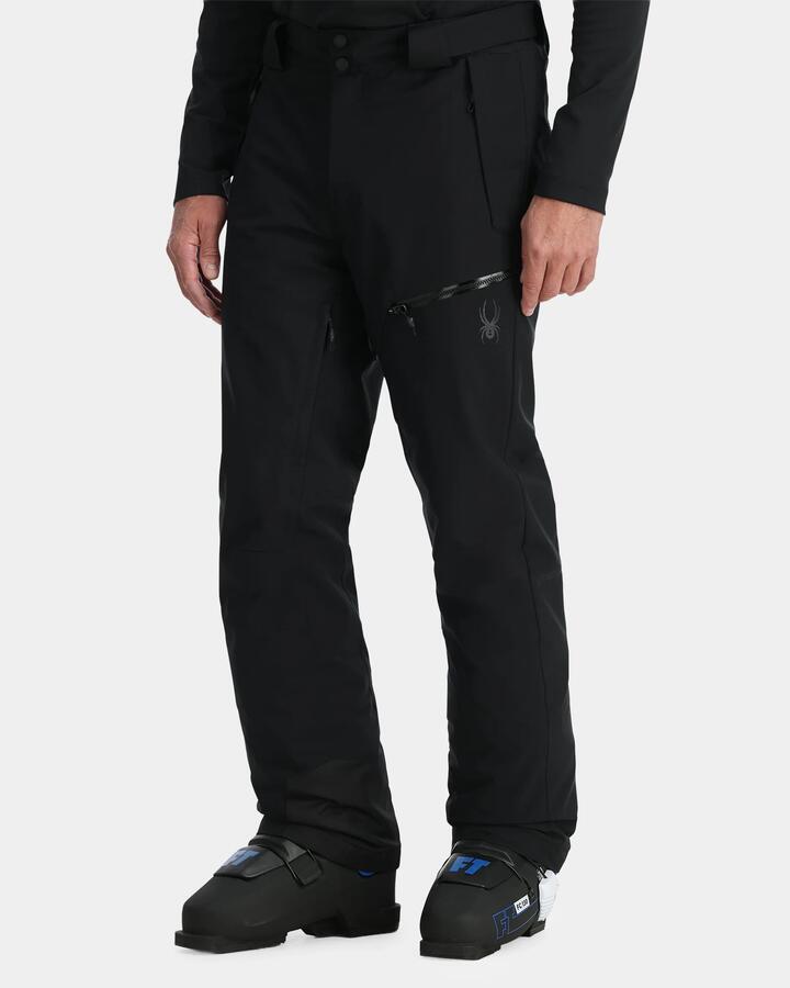 Image of a model wearing Pants. Product name - Spyder Mens Fuse Snow Pants Black in Black colour by brand - Spyder
