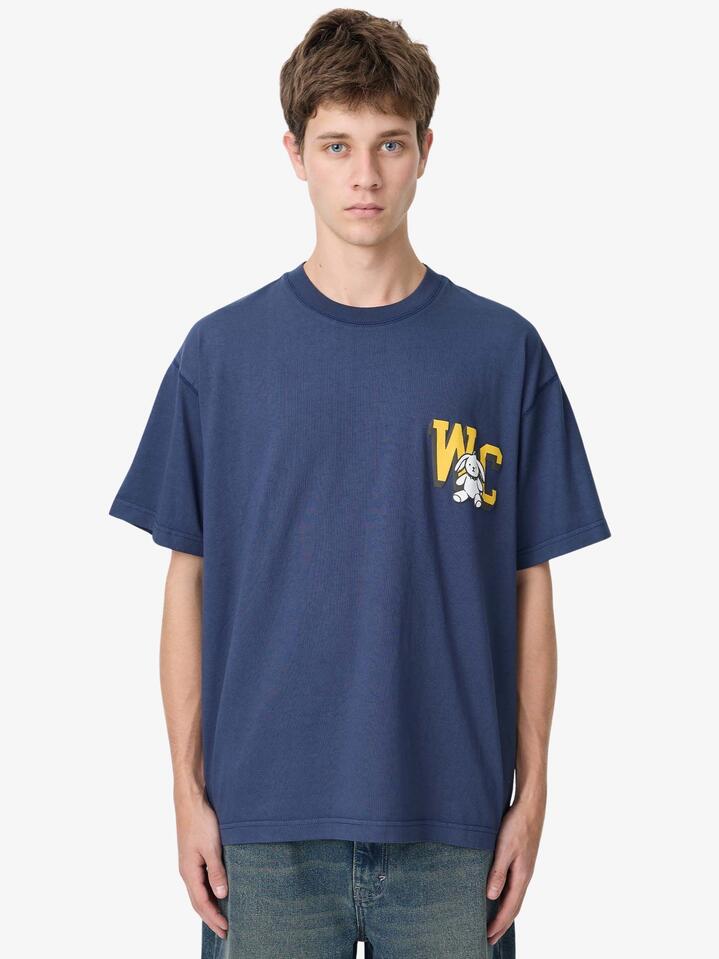 Image of a model wearing Tops. Productname: Weekend Cartel WC Tee in Navy colour by brand - Weekend Cartel